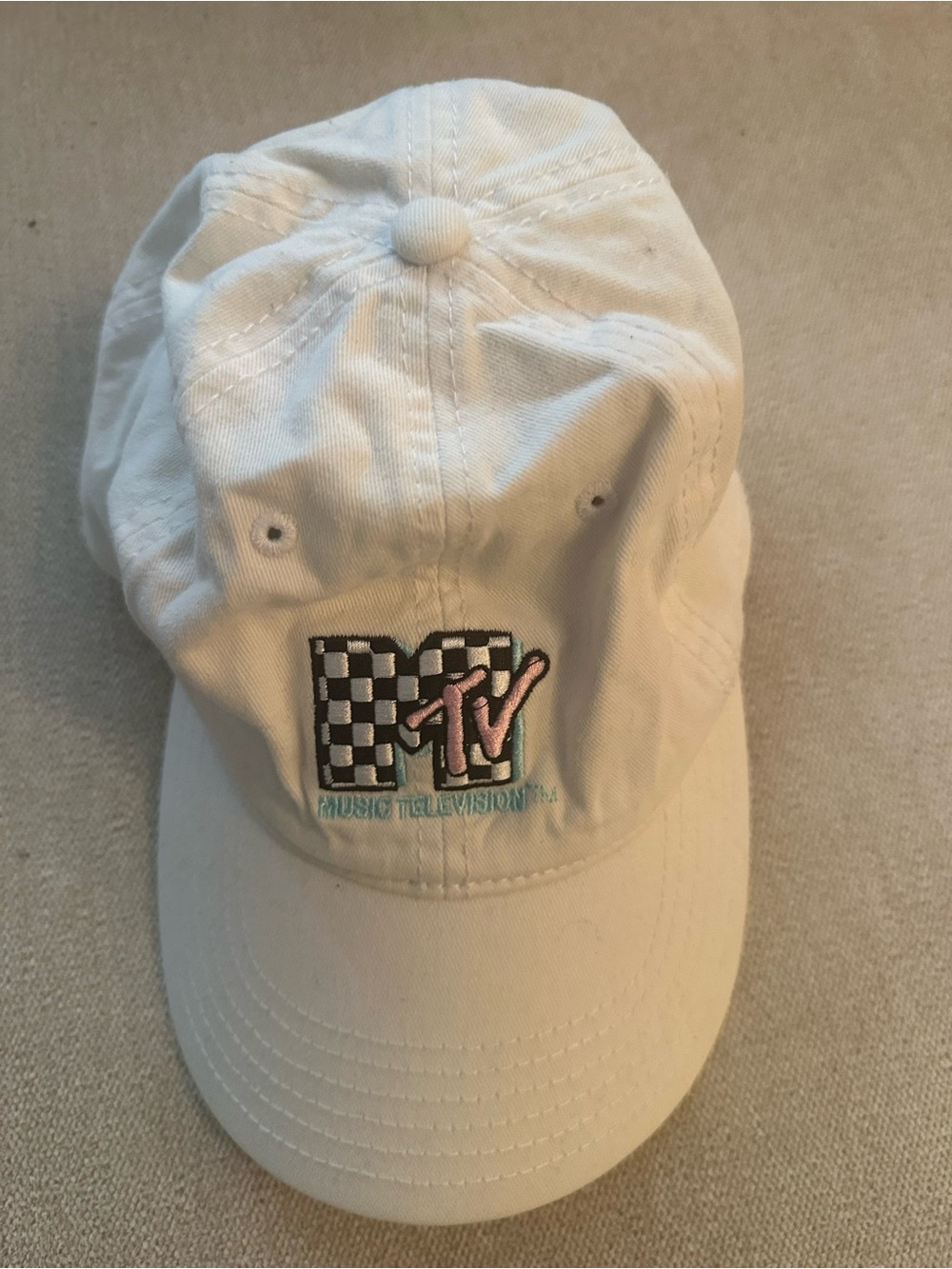 MTV White Baseball Cap with Checker Logo and Pink Accent